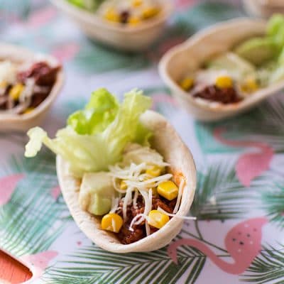 Recette de Mini Panadillas apéritives : boeuf, avocat, maïs, salade, fromage
