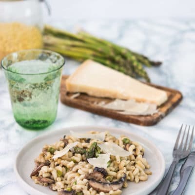 Recette de Risotto de coquillettes aux asperges vertes, champignons et parmesan